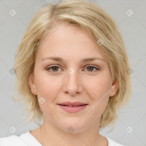 Joyful white young-adult female with medium  brown hair and blue eyes