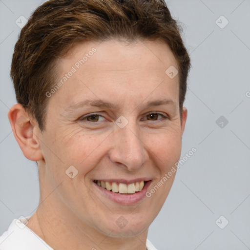 Joyful white adult female with short  brown hair and brown eyes