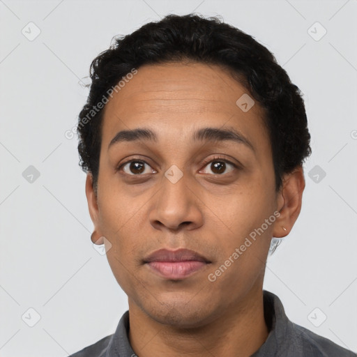 Neutral latino adult male with short  black hair and brown eyes