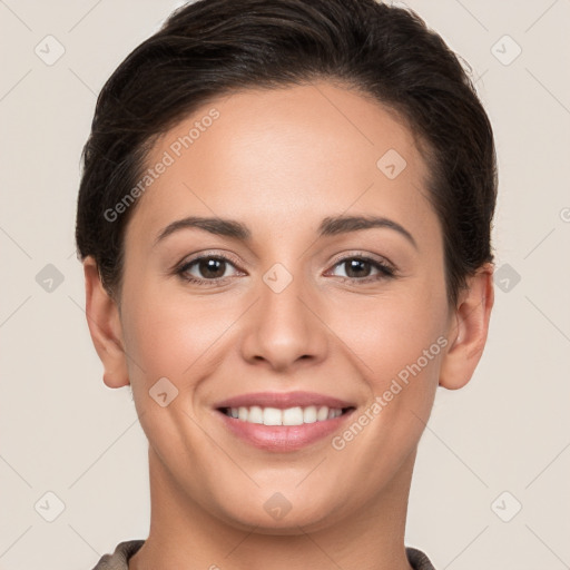 Joyful white young-adult female with short  brown hair and brown eyes