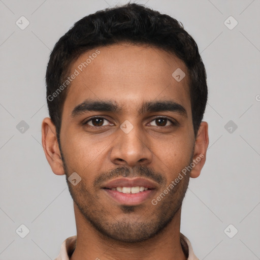 Joyful latino young-adult male with short  black hair and brown eyes