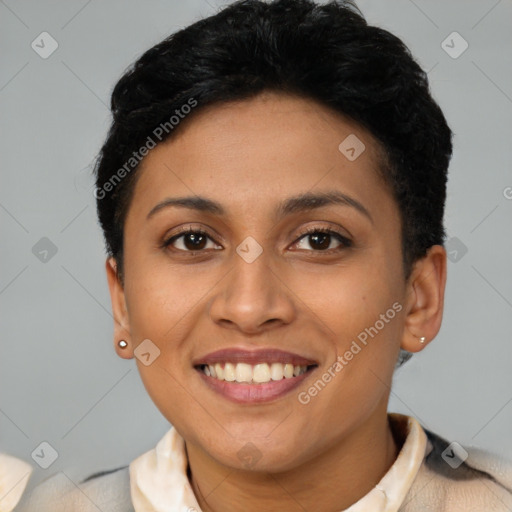 Joyful latino young-adult female with short  black hair and brown eyes