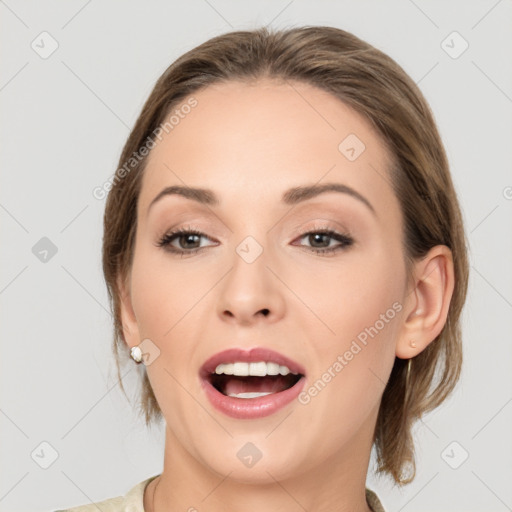 Joyful white young-adult female with medium  brown hair and grey eyes