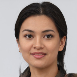 Joyful asian young-adult female with medium  brown hair and brown eyes