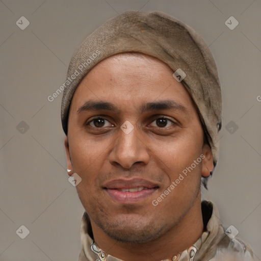 Joyful white adult male with short  black hair and brown eyes