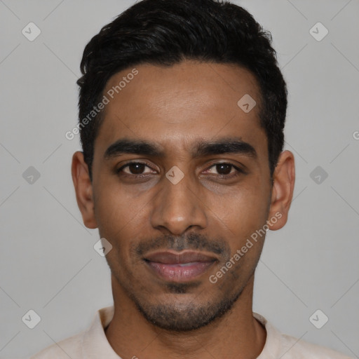 Joyful latino young-adult male with short  black hair and brown eyes