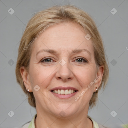 Joyful white adult female with medium  brown hair and grey eyes