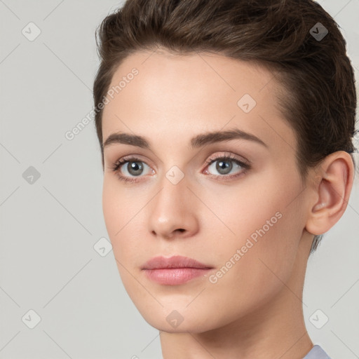 Neutral white young-adult female with short  brown hair and brown eyes