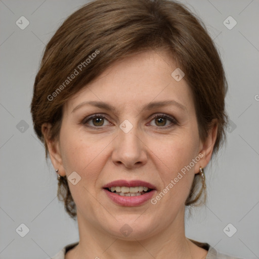 Joyful white adult female with medium  brown hair and grey eyes