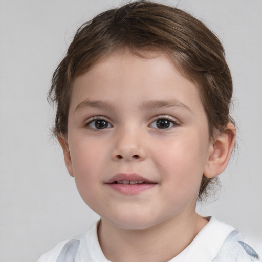 Joyful white child female with medium  brown hair and brown eyes