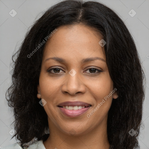 Joyful black young-adult female with medium  brown hair and brown eyes