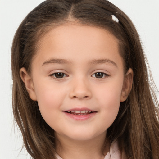 Joyful white child female with long  brown hair and brown eyes