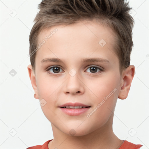 Joyful white child male with short  brown hair and brown eyes