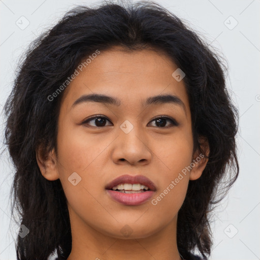 Joyful asian young-adult female with long  brown hair and brown eyes