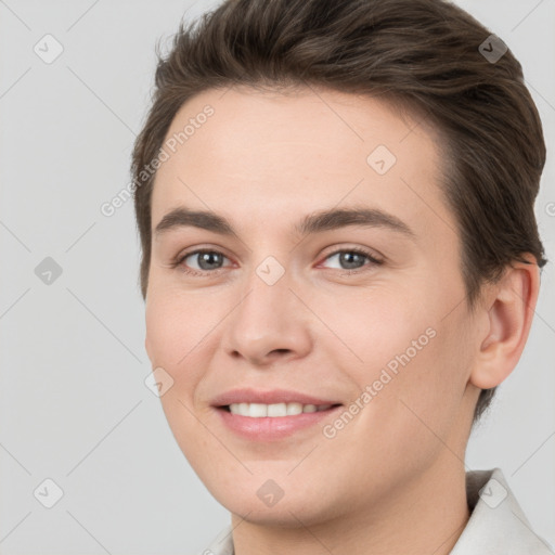 Joyful white young-adult female with short  brown hair and brown eyes