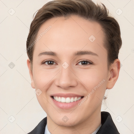 Joyful white young-adult female with short  brown hair and brown eyes