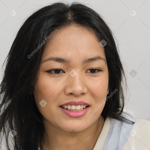 Joyful asian young-adult female with long  brown hair and brown eyes