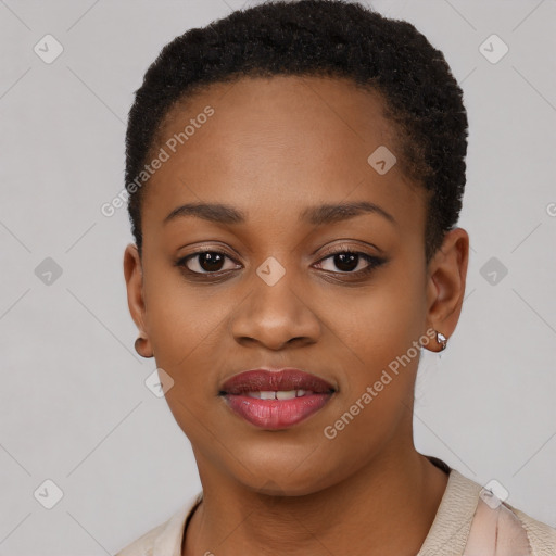 Joyful black young-adult female with short  brown hair and brown eyes