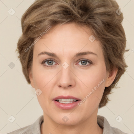 Joyful white adult female with short  brown hair and grey eyes