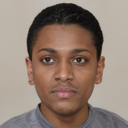 Neutral black young-adult male with short  black hair and brown eyes