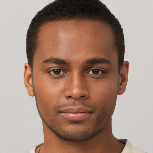 Neutral black young-adult male with short  brown hair and brown eyes