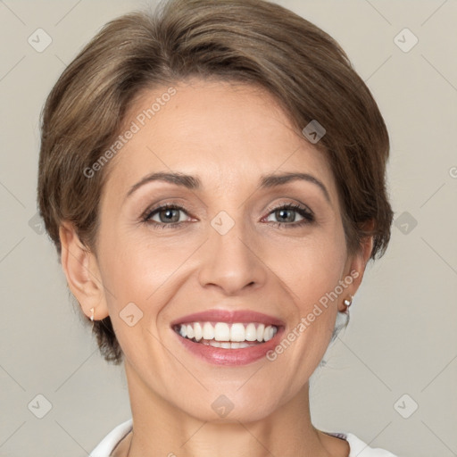 Joyful white adult female with medium  brown hair and grey eyes