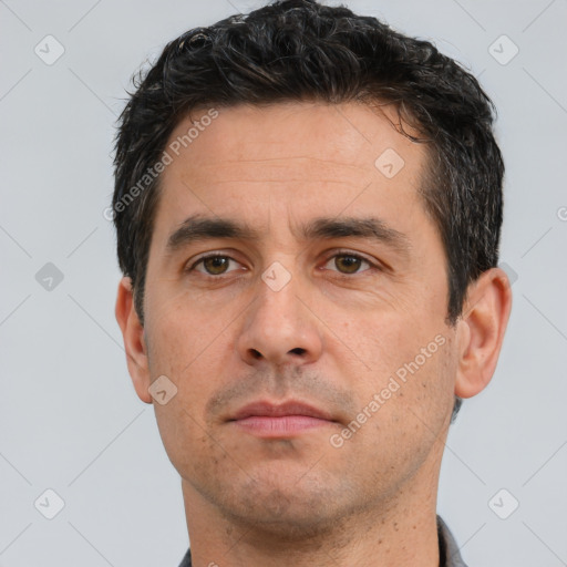 Neutral white adult male with short  brown hair and brown eyes