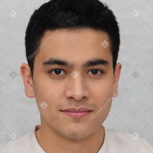 Joyful latino young-adult male with short  brown hair and brown eyes