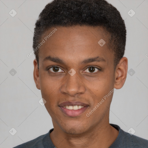 Joyful black young-adult male with short  brown hair and brown eyes