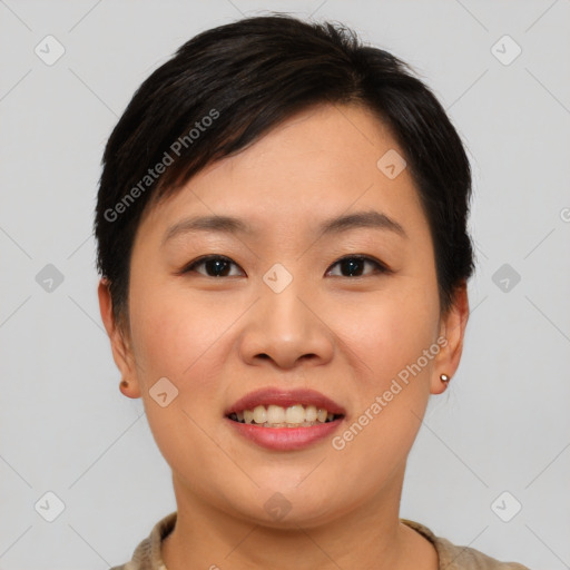 Joyful asian young-adult female with short  brown hair and brown eyes