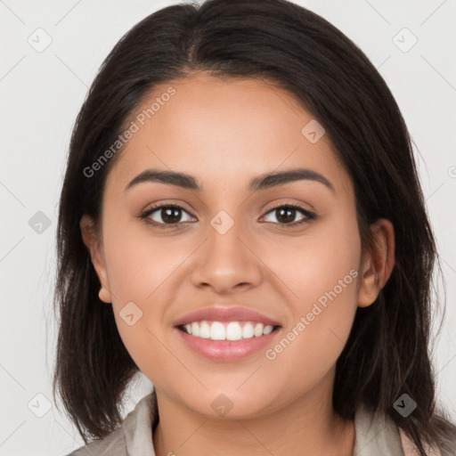 Joyful white young-adult female with long  brown hair and brown eyes