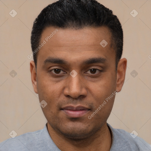 Joyful latino young-adult male with short  black hair and brown eyes