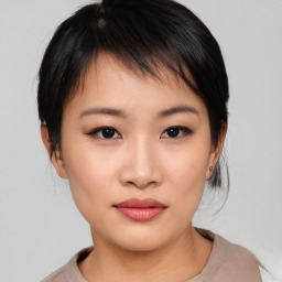 Neutral asian young-adult female with medium  brown hair and brown eyes