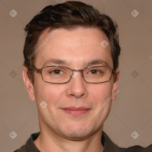 Joyful white adult male with short  brown hair and grey eyes