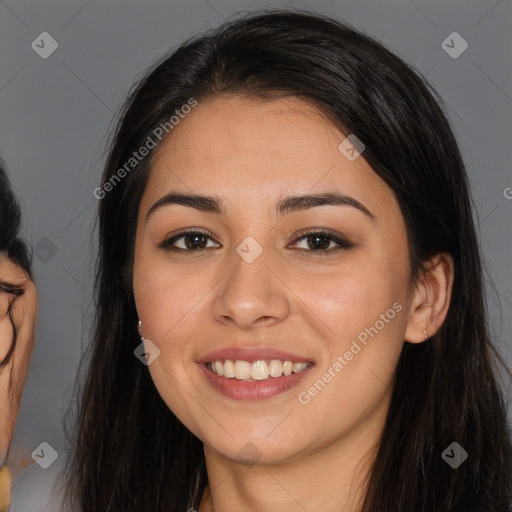 Joyful white young-adult female with long  brown hair and brown eyes