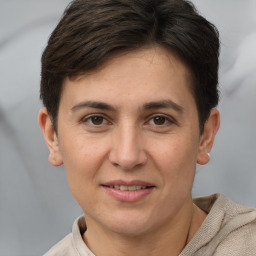 Joyful white adult female with short  brown hair and brown eyes