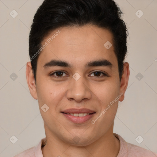 Joyful latino young-adult male with short  brown hair and brown eyes