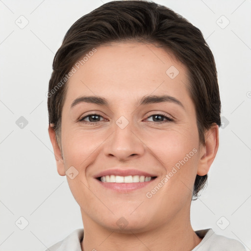 Joyful white young-adult female with short  brown hair and brown eyes