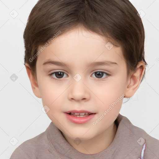 Joyful white child female with short  brown hair and brown eyes