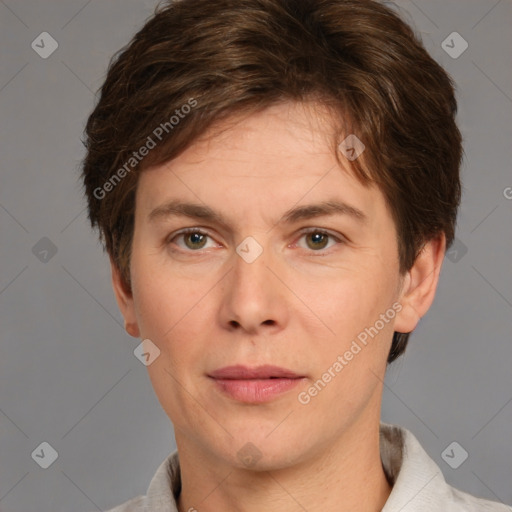 Joyful white adult male with short  brown hair and grey eyes