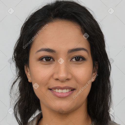 Joyful latino young-adult female with long  brown hair and brown eyes