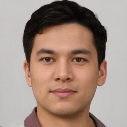 Neutral asian young-adult male with short  brown hair and brown eyes