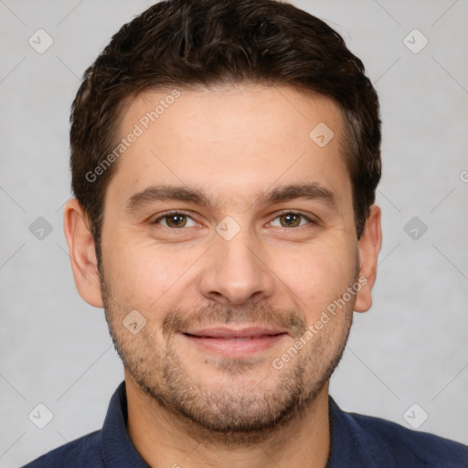 Joyful white young-adult male with short  brown hair and brown eyes