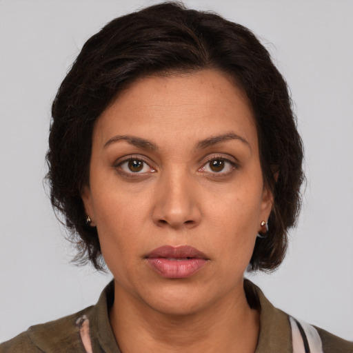 Neutral white young-adult female with medium  brown hair and brown eyes