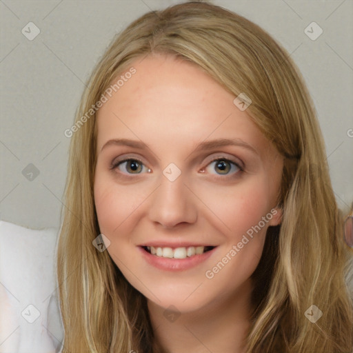 Joyful white young-adult female with long  brown hair and blue eyes