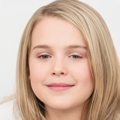 Joyful white child female with long  brown hair and brown eyes