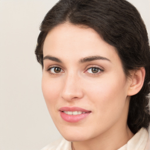 Joyful white young-adult female with medium  brown hair and brown eyes