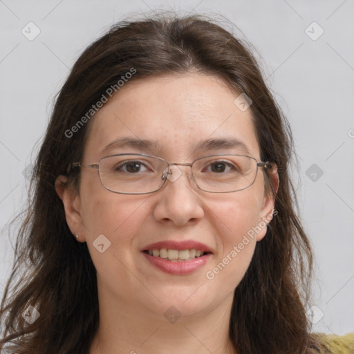 Joyful white adult female with long  brown hair and brown eyes