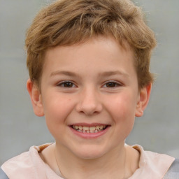 Joyful white child male with short  brown hair and brown eyes