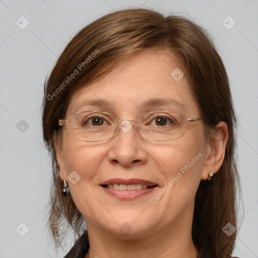 Joyful white adult female with medium  brown hair and grey eyes